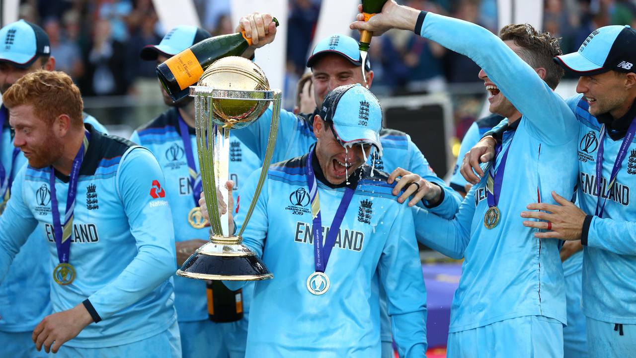 Eoin Morgan is soaked in champagne. Photo by Michael Steele/Getty Images
