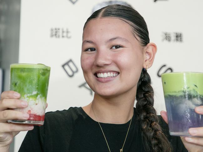 Le Le Murphy with some colourful matcha drinks at Bobby Bangs’s. Picture: Glenn Campbell.