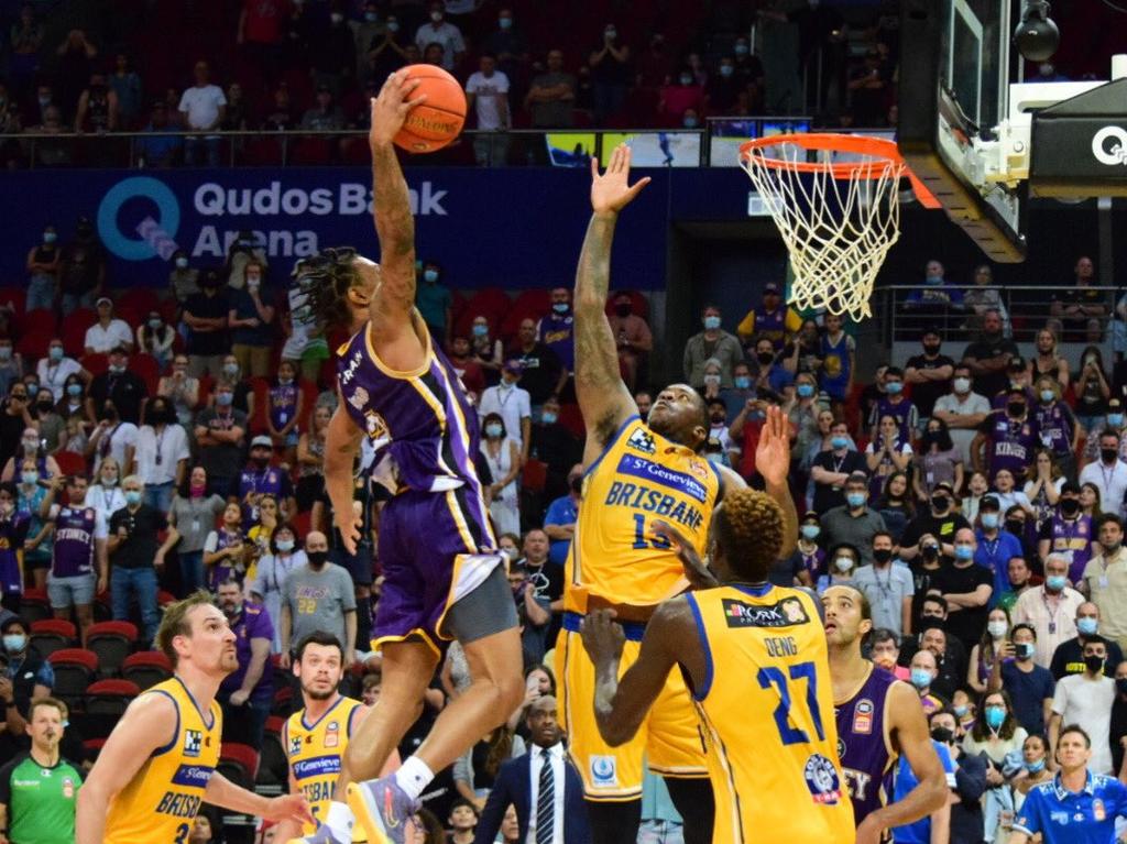 Kings guard Jaylen Adams climbs high for a massive dunk.