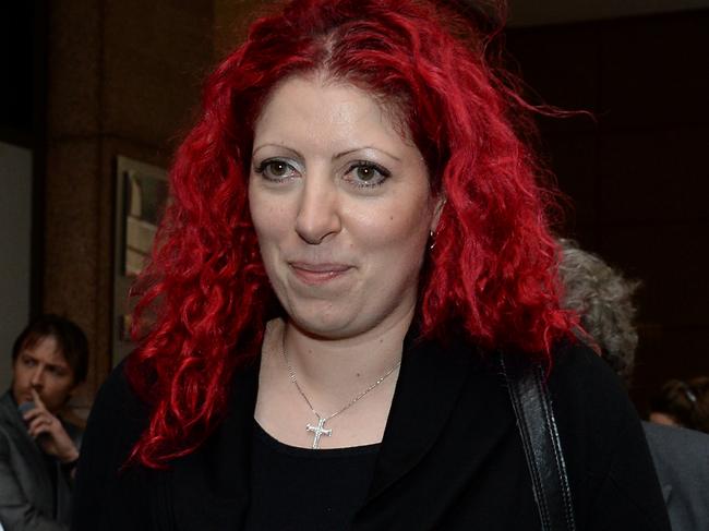 Health Service Union secretary Diana Asmar departs after giving evidence at The Royal Commission into Trade Union Governance and Corruption in Sydney, Tuesday, Aug. 26, 2014. The Royal Commission is investigating corruption at the Health Services Union. (AAP Image/Dan Himbrechts) NO ARCHIVING