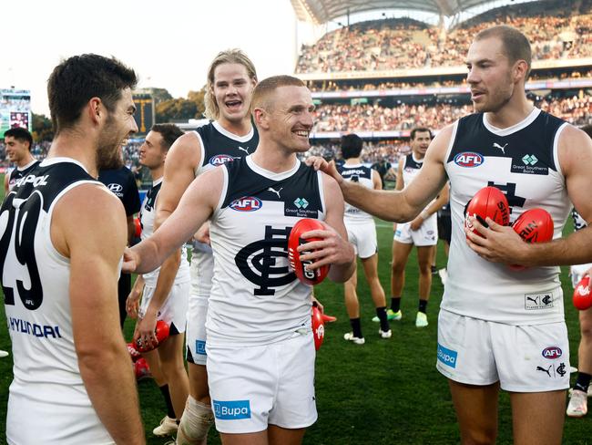 ADELAIDE, AUSTRALIA - APRIL 06: Matthew Cottrell of the Blues celebrates with teammates during the 2024 AFL Round 04 match between the Fremantle Dockers and the Carlton Blues at Adelaide Oval on April 06, 2024 in Adelaide, Australia. (Photo by Michael Willson/AFL Photos via Getty Images)