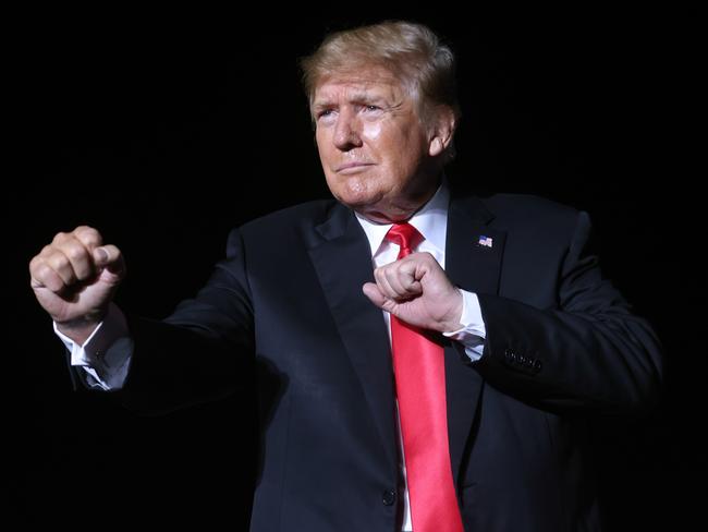 DES MOINES, IOWA - OCTOBER 09: Former President Donald Trump speaks to supporters during a rally at the Iowa State Fairgrounds on October 09, 2021 in Des Moines, Iowa. This is Trump's first rally in Iowa since the 2020 election.   Scott Olson/Getty Images/AFP == FOR NEWSPAPERS, INTERNET, TELCOS & TELEVISION USE ONLY ==