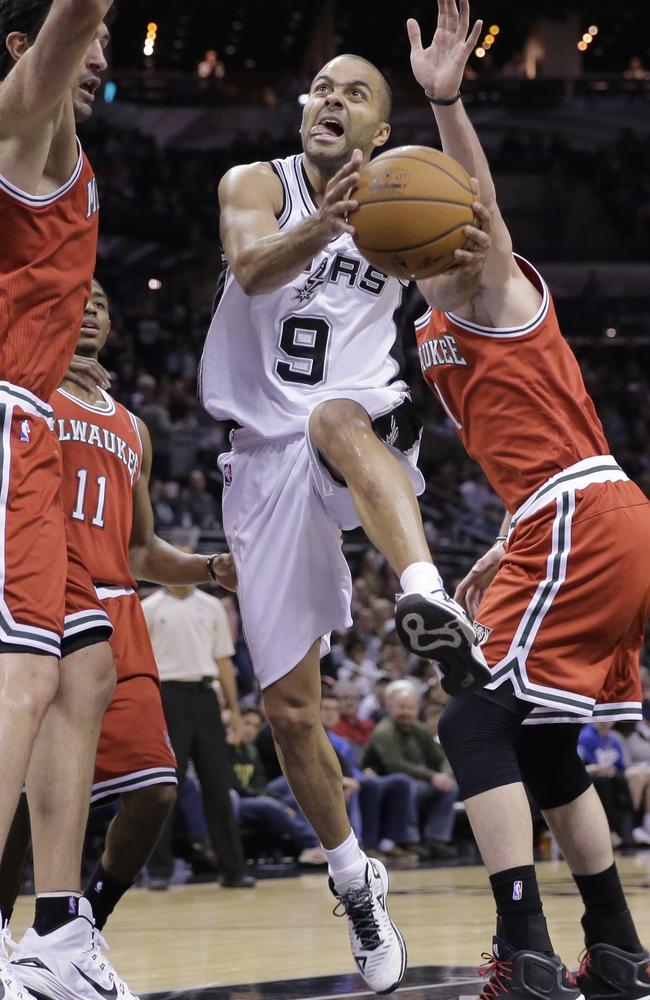 San Antonio’s Tony Parker drives to the basket.