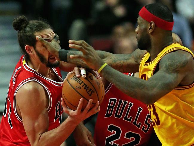 LeBron James face palms Bulls big man Joakim Noah.