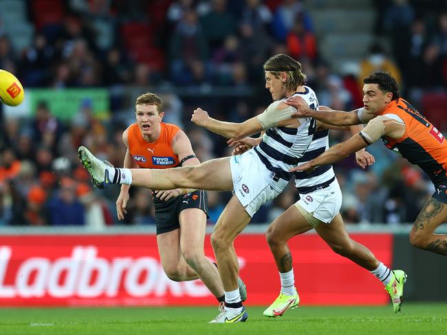 Mark Blicavs wins a clearance for Geelong. Picture: Mark Metcalfe/AFL Photos/via Getty Images