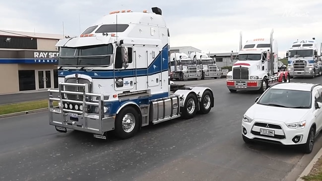 Truck convoy for Ray Scott