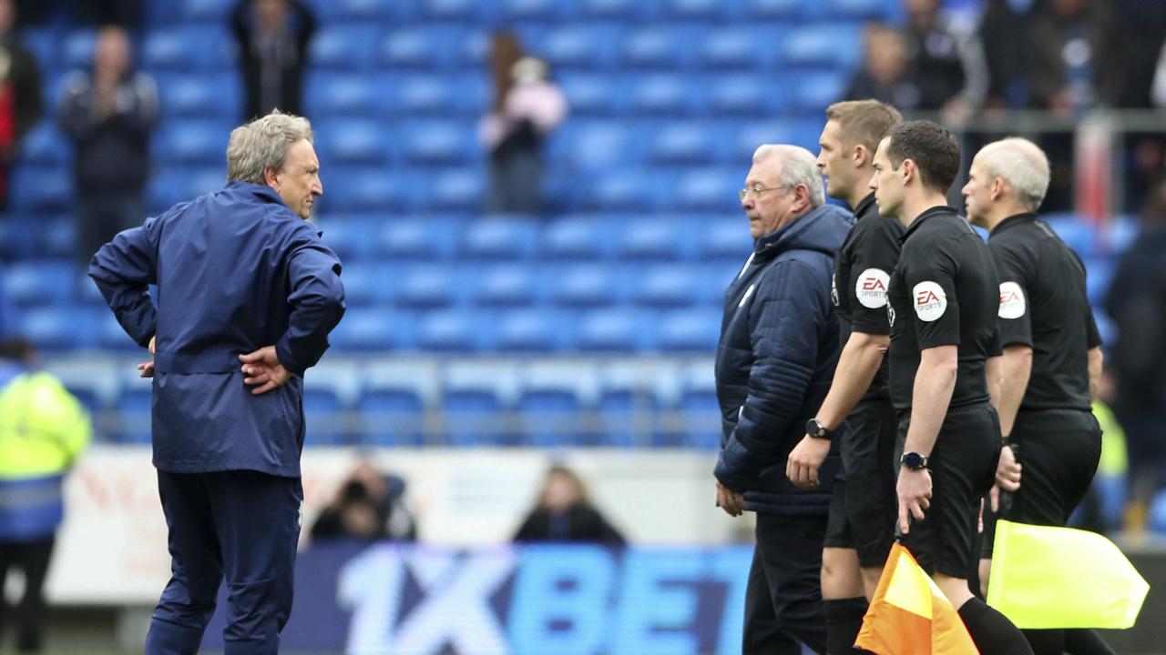 Cardiff City manager Neil Warnock stares down the officials
