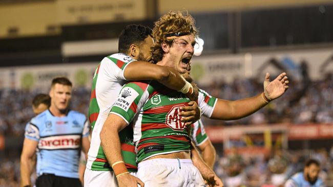 Campbell Graham of the Rabbitohs celebrates with his teammates after scoring a try during the round one NRL match between Cronulla Sharks and South Sydney Rabbitohs at PointsBet Stadium on March 04, 2023 in Cronulla, Australia. . Picture NRL Photos