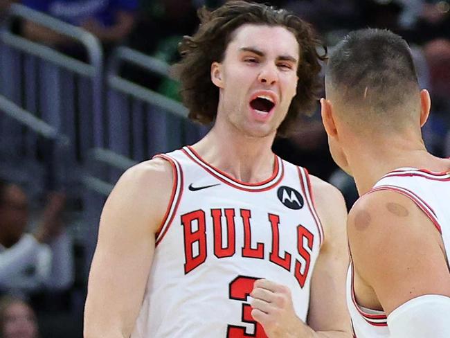 MILWAUKEE, WISCONSIN - OCTOBER 25: Josh Giddey #3 of the Chicago Bulls reacts to a three point shot during the second half of a game against the Milwaukee Bucks at Fiserv Forum on October 25, 2024 in Milwaukee, Wisconsin. NOTE TO USER: User expressly acknowledges and agrees that, by downloading and or using this photograph, User is consenting to the terms and conditions of the Getty Images License Agreement.   Stacy Revere/Getty Images/AFP (Photo by Stacy Revere / GETTY IMAGES NORTH AMERICA / Getty Images via AFP)