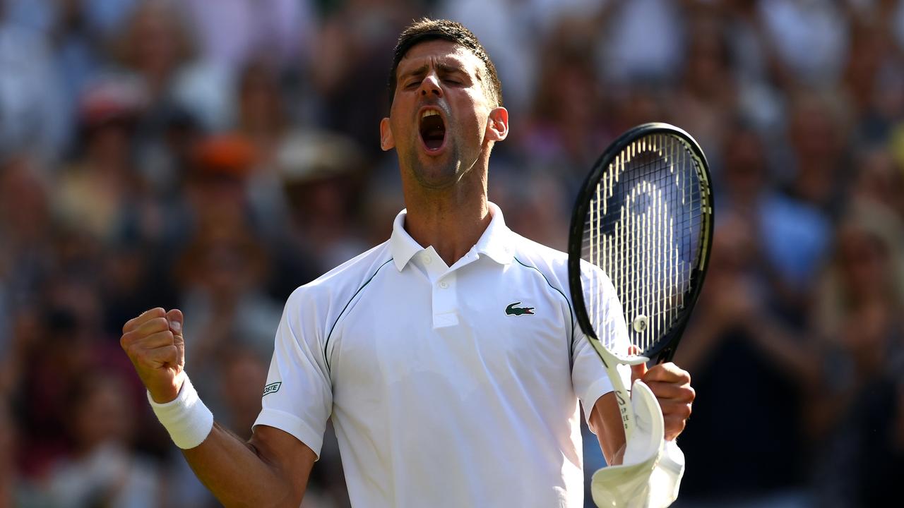 Novak Djokovic of Serbia celebrates match point against Cameron Norrie of Great Britain during the Mens' Singles Semi Final match.