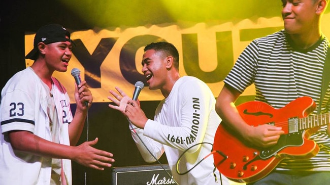 From left: Wilkinson Papalii-Afoa, Micah Papalii-Talanai and Lucas Tekii enjoy an onstage moment.