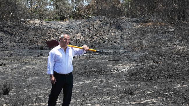 Mayor Tom Tate at The Spit after the fire. Picture Glenn Hampson.