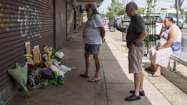 Floral tributes are pictured at the scene. Picture: NewsWire / Simon Bullard.