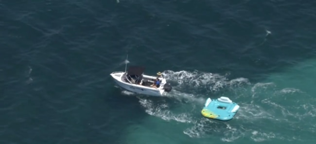 The floatie being towed back to sure after the women were rescued. Picture: 9NEWS