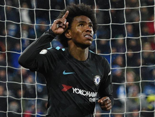 Willian celebrates. / AFP PHOTO / Oli SCARFF