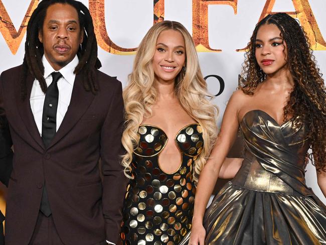 (L-R) Tina Knowles, rapper Jay-Z, singer-songwriter Beyonce and their daughter Blue Ivy Carter attend the world premiere of Disney's "Mufasa: The Lion King" at the Dolby theater in Hollywood, California, December 9, 2024. (Photo by Lisa O'CONNOR / AFP)