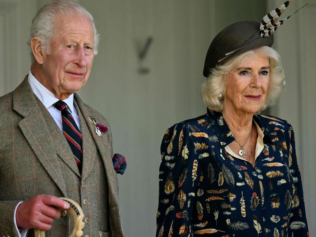 Britain's King Charles III and Britain's Queen Camilla attend the annual Braemar Gathering in Braemar, central Scotland, on September 7, 2024. The Braemar Gathering is a traditional Scottish Highland Games which predates the 1745 Uprising, and since 1848 it has been regularly attended by the reigning Monarch and members of the Royal Family. (Photo by ANDY BUCHANAN / AFP)