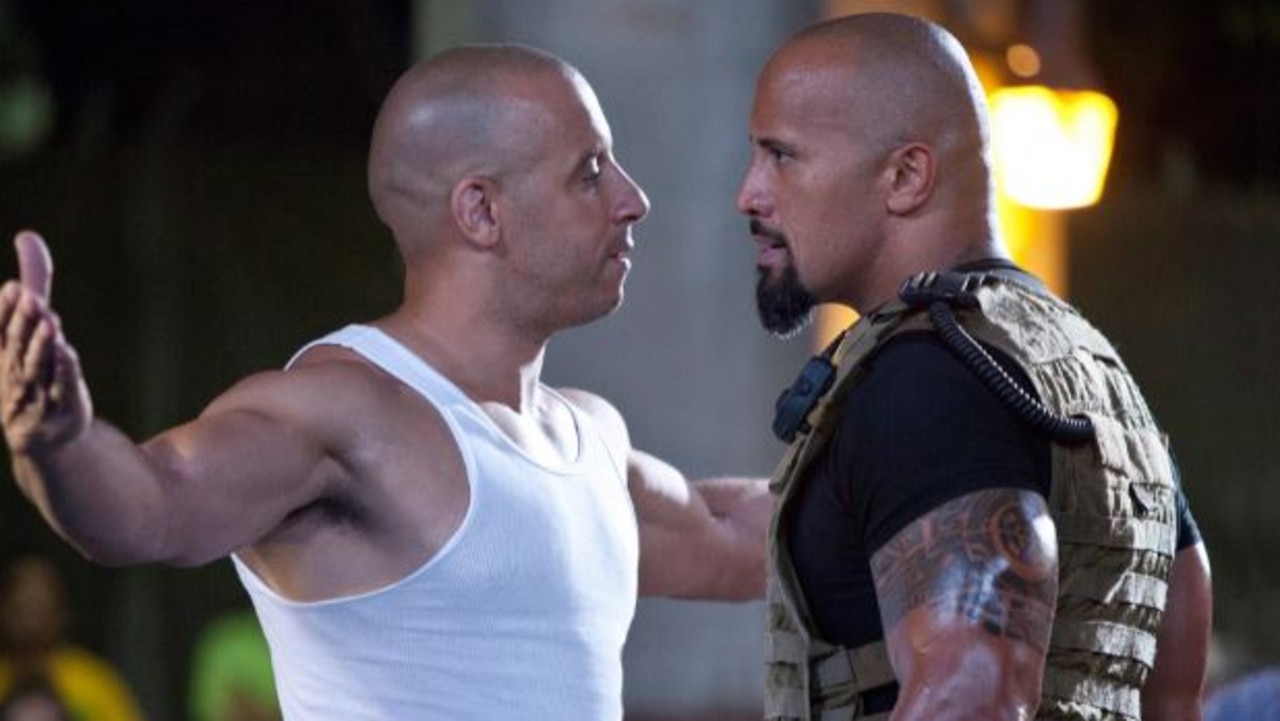 Vin Diesel and Dwayne Johnson face off in 2011’s Fast Five. Picture: Universal