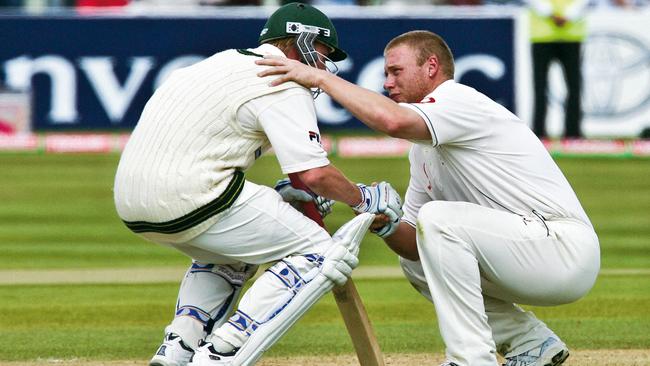 England’s Andrew Flintoff, right, consoles Australian batsman Brett Lee after England won the Second Ashes Test by two runs at Edgbaston in 2005. Picture: Getty Images