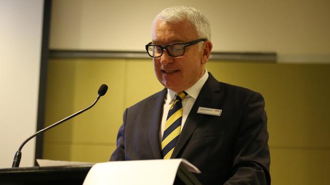 Prime Media chairman John Hartigan addresses a shareholder meeting in Sydney regarding the Seven West Media takeover offer. Britta Campion