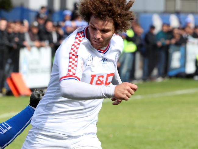 Corey Sewell in action for Melbourne Knights.