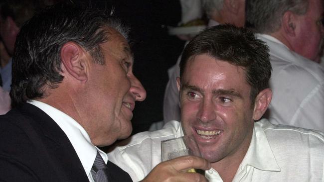 Politis (left) and captain Brad Fittler in 2002. Picture: Noel Kessel