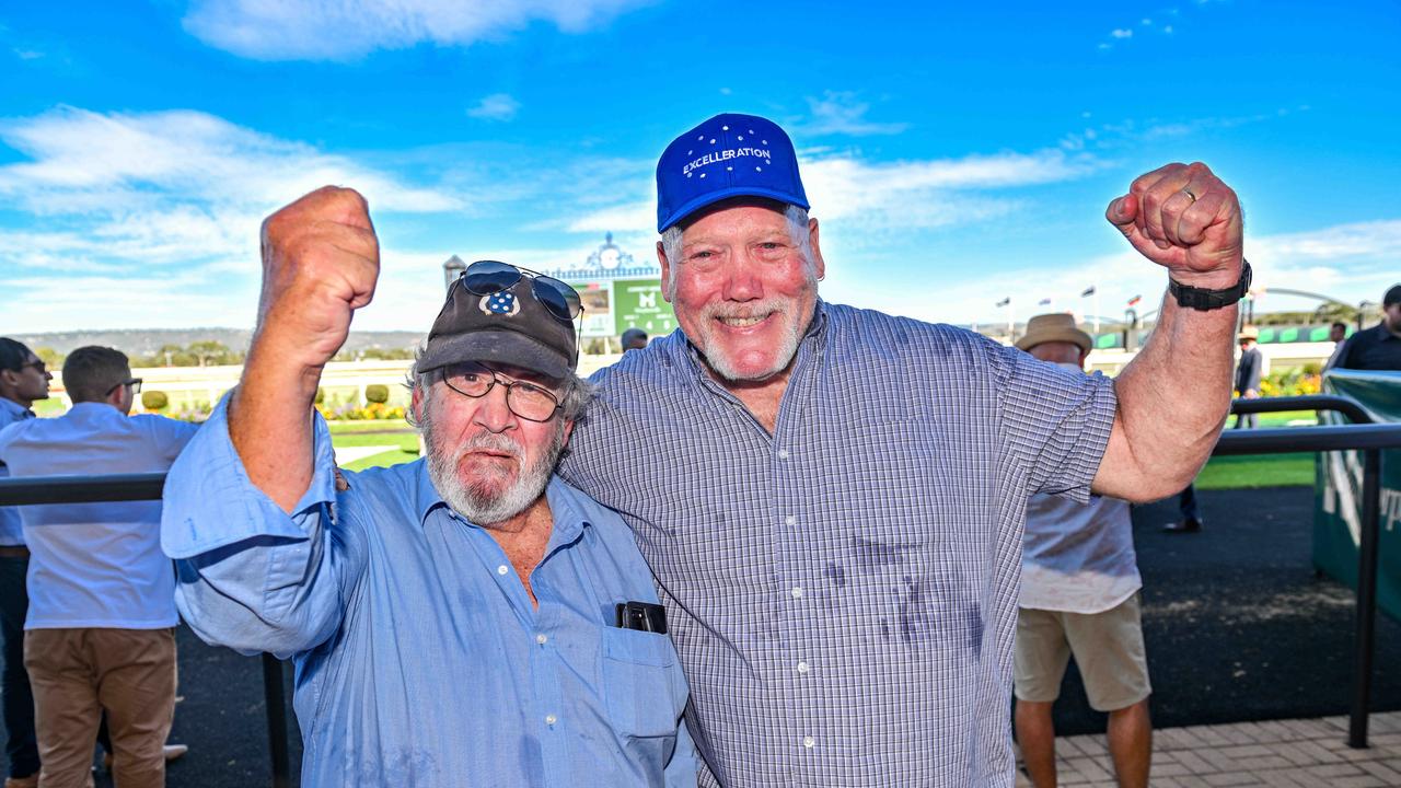 Part-owners Ray Nicholson, left, and Grant Thorson celebrate after their horse Excelleration wins the Adelaide Cup at Morphettville Racecourse. Picture: NCA NewsWire/Brenton Edwards