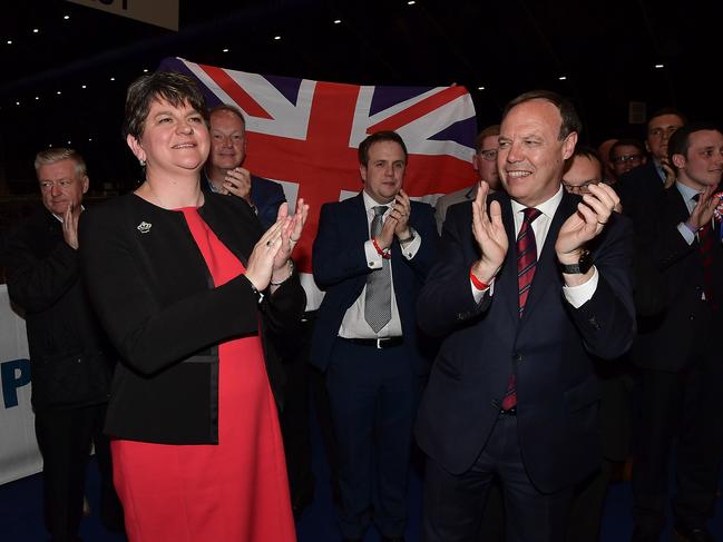 DUP leader Arlene Foster celebrates with DUP deputy leader Nigel Dodds at the Belfast count centre after the election. Picture: Getty Images