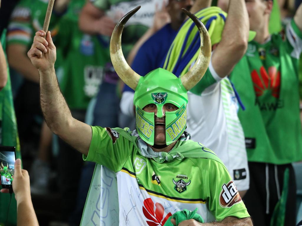 Raiders fan Simon Tayoun throws his support behind Canberra during the 2019 NRL grand final. Picture: Jonathan Ng