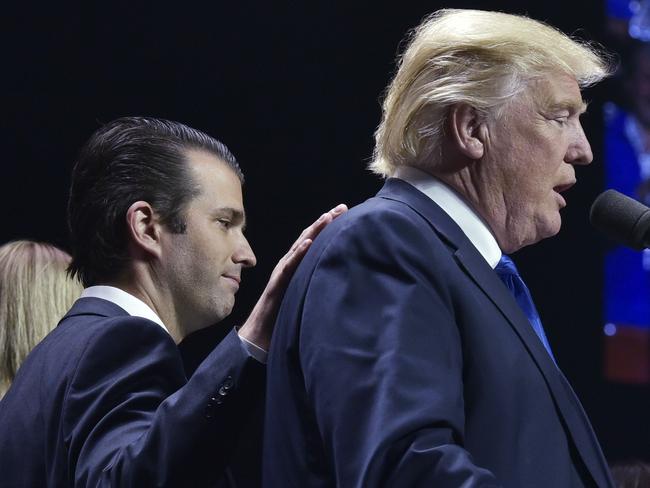 Father and son. Picture: AFP/Mandel Ngan