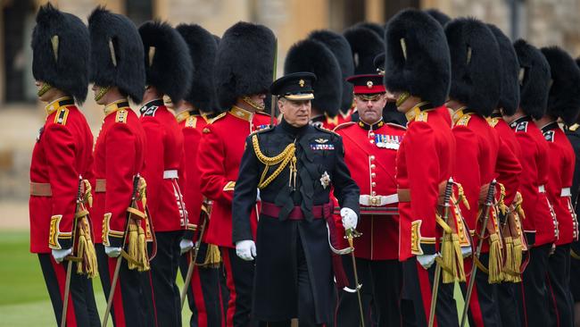 Prince Andrew, the Duke of York makes an inspection during a parade by the Grenadier Guards at Windsor Castle in March.