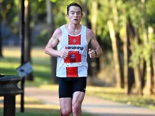 POWERING ON: Brisbane's Brendan Press on his way to winning the male half marathon at the 7 Rocky River Run yesterday. Picture: Allan Reinikka ROK300619a21k1