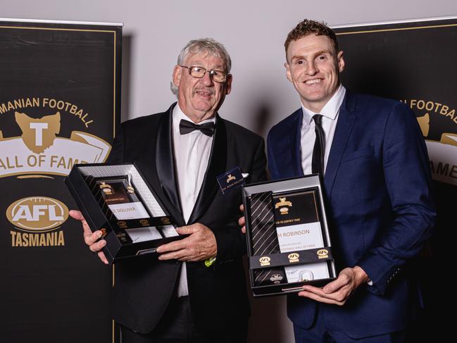 Mitch Robinson with fellow Tasmanian Football Hall of Fame inductee Rickie Dolliver earlier this year. Picture: Linda Higginson / AFL Tasmania