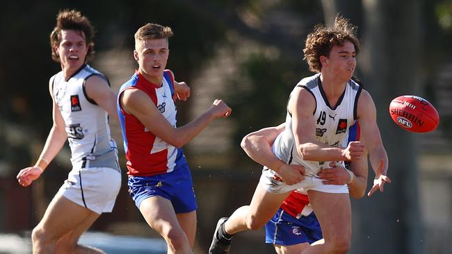 GWV’s Oliver Hannaford gets the ball away under pressure. Pic: Getty.