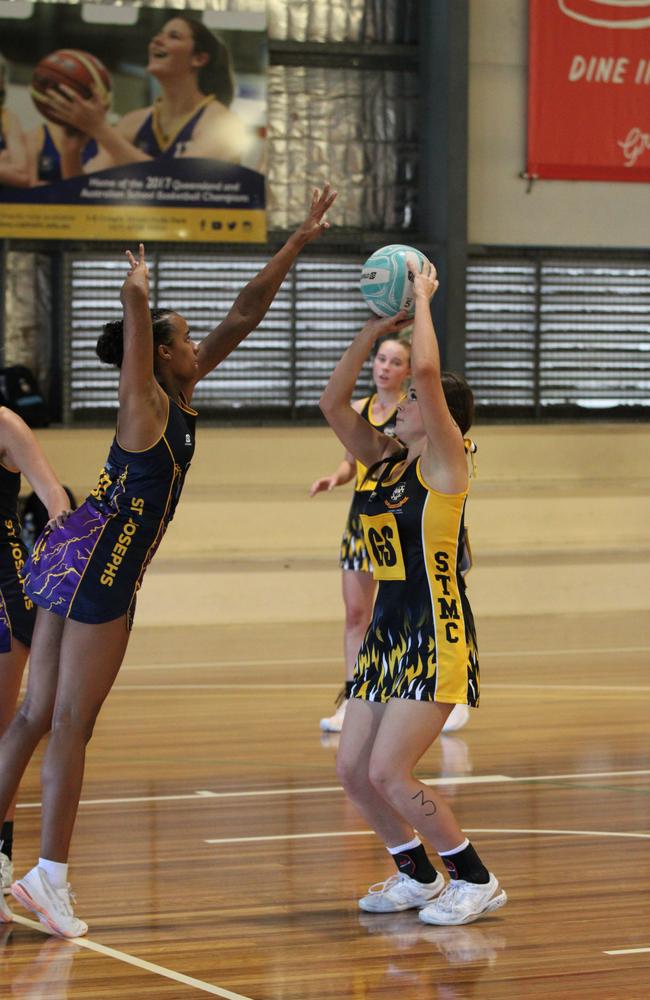 Netball action from QISSN 2024 in Townsville. St Josephs College v St Thomas More College