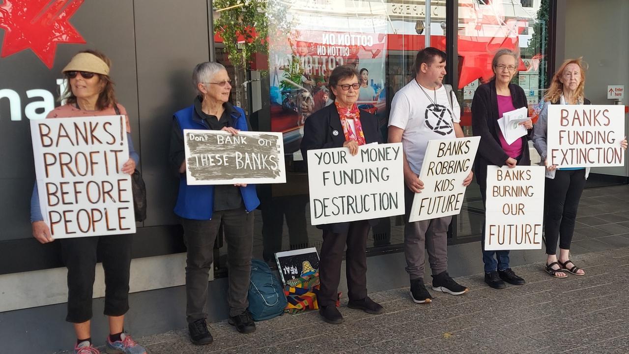 Extinction Rebellion protesters at NAB Launceston on December 7, 2022. Picture: XRNT