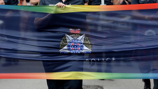 Victoria Police members walking in the Pride March. Picture: Andrew Henshaw