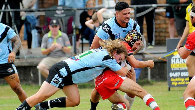 Brian Quinlin-Randall held in a tackle. Picture: Leigh Jensen