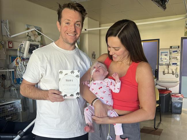 Hunter, with mum and dad Nathan and Georgia Graham.