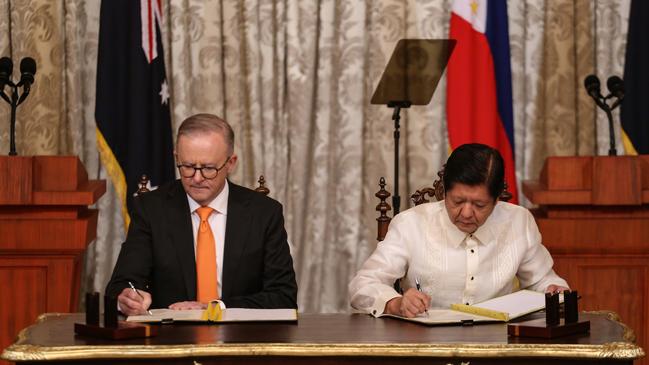 Australia's Prime Minister Anthony Albanese and Philippine President Ferdinand Marcos Jr. sign the Memorandum of Understanding during his visit at the Malacanang Presidential Palace on September 8, 2023 in Manila, Philippines. Picture:Getty Images