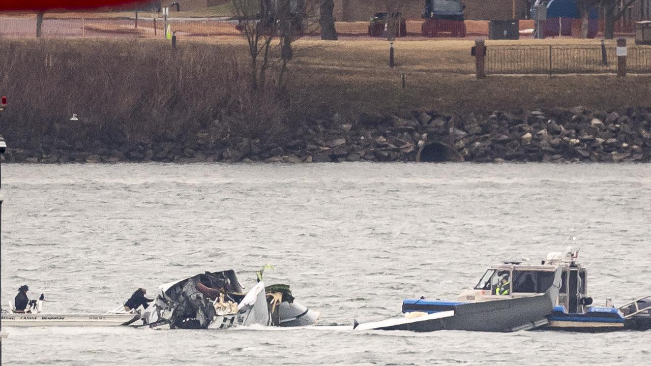 Recovery teams on Friday search the wreckage after the crash. Picture: Al Drago/Getty Images via AFP