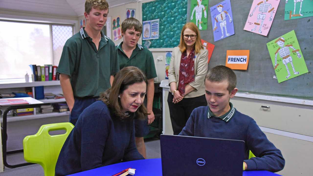 The Premier sits with Leon Noble as he skypes his tutor, while Matt York, Charlie Maunder and principal Melissa Graham watch on. Picture: Alexia Austin