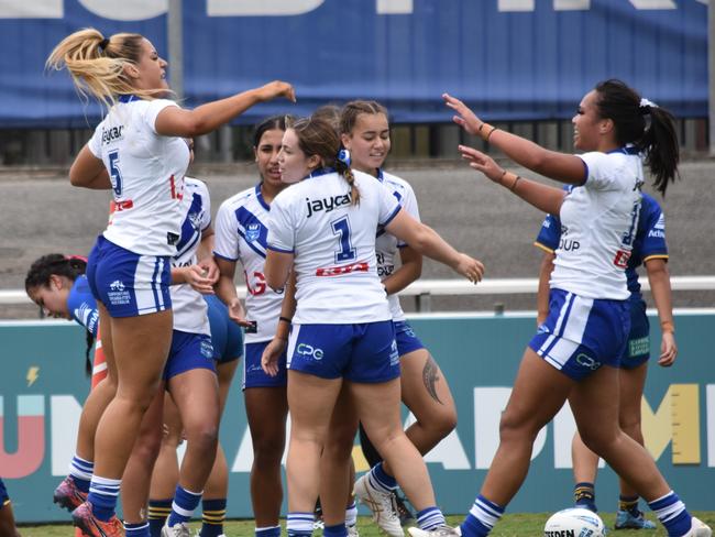 Canterbury celebrates a try to Audrey Nadaya-Harb (left). Picture: Sean Teuma