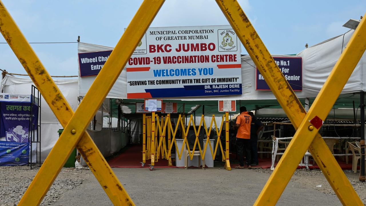 Barriers are seen outside a COVID-19 coronavirus vaccination centre due to shortage of vaccine supplies in Mumbai. Picture: Punit Paranjpe / AFP.