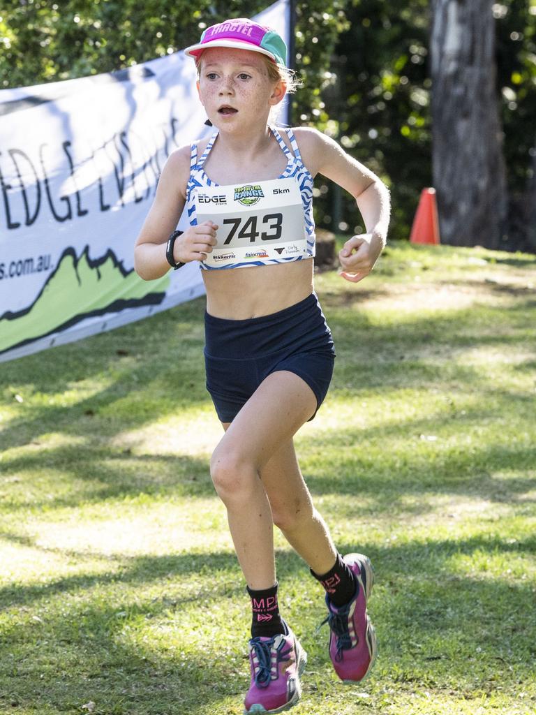 Violet Richardson 9yo wins the 5km event outright. Top of the Range adventure trail run at Picnic Point. Sunday, April 2, 2023. Picture: Nev Madsen.