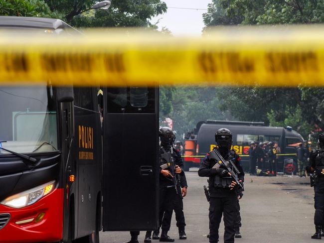 Police secure the site of a suicide bombing at a police station in Bandung, West Java province. Picture: AFP