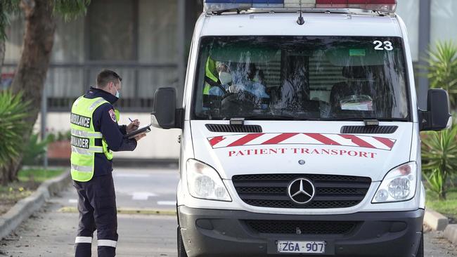 Residents are removed from St Basil's home for the aged in Fawkner. Picture: Stefan Postles