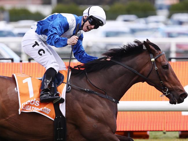 MELBOURNE , AUSTRALIA. October 14 , 2023.   Caulfield Guineas race day. Race 7. The Might and Power.  Jockey Tim Clark celebrates aboard Alligator Blood after winning the Might and Power   .Picture by Michael Klein