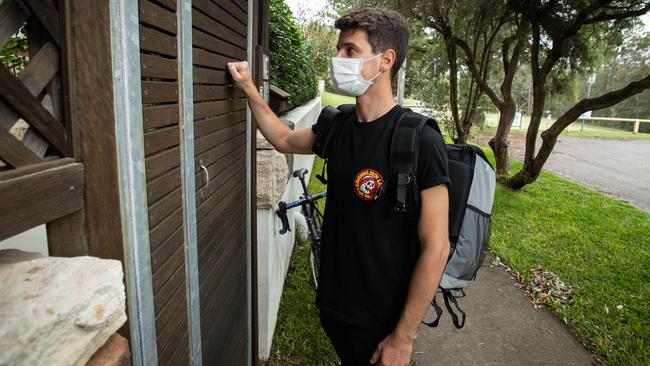 Luca Reigada, 27, is a bartender from The Hold, Manly, who makes cocktails on your doorstep. (AAP Image / Julian Andrews).