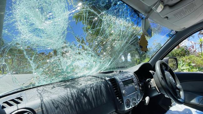 Debris smashed car windows at Eagle Heights, Mt Tambourine. Picture: NCA NewsWire / Scott Powick